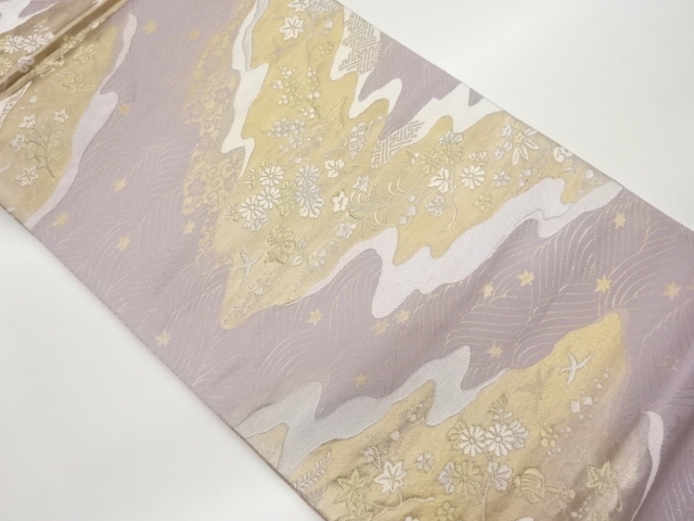 曲線に草花・波模様織出し袋帯